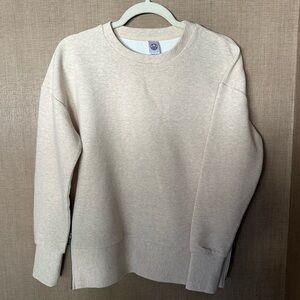 Te Verde Ribbed Sweater With Side Zippers. Cream, XS.